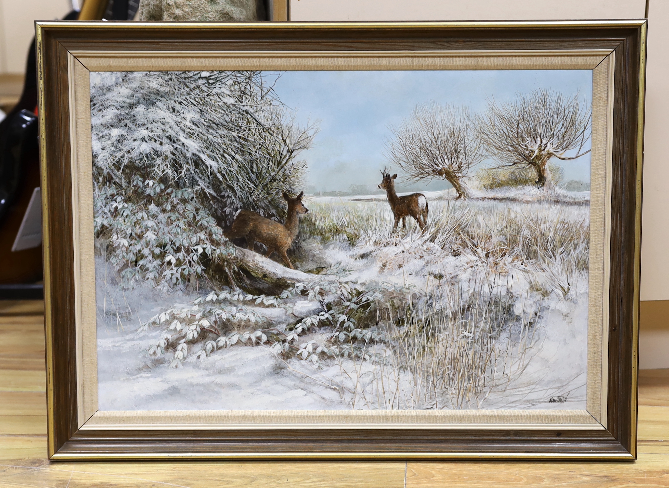 Ken Turner (b.1926) oil on board, 'Roe deer in the snow', signed, 44 x 65cm